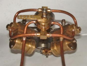 Double acting V twin oscillating steam engine